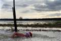 Housing campaigner's flood water swim 