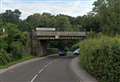 Busy route shut after vehicle strikes bridge