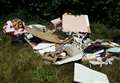 Insulation and debris dumped in rural lane