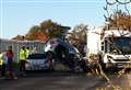 Road closed after car collides with dustcart