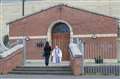 Socially-distanced queues in west Belfast as priest hears confessions