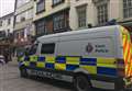 Police van pulls up outside cafe