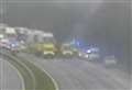 Two freed after van overturns on M20