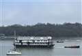 Hotel barge makes its way up the river 