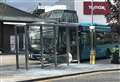 Bus crashes into bus stop