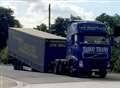 Falling HGV trailer damages road