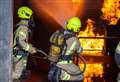 Fire crews battle roof blaze