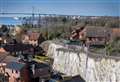 Homes protected from eroding cliff at risk of collapse