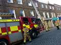 Shoppers dodge falling masonry as businesses evacuated