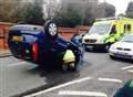 Elderly man 'lucky' after car flips onto roof.