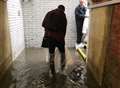 Flash flooding sees commuters wading for the train