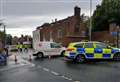 Burst drain floods road