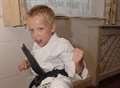 Boy becomes UK's youngest karate black belt