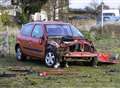 Car smashes into field