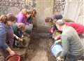 Bones, coins and pottery unearthed at church dig 