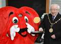 Market holds pancake flipping competition 