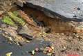 Road closed by large sinkhole