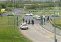 Five arrests as activists lie in road to block business park entrance