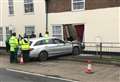 Mercedes ploughs through home on busy route