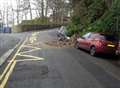 Road could stay shut for three weeks after wall collapses near school