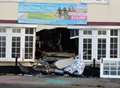 Arrest after two cars crash into pub