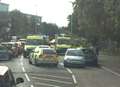 Three-car crash in busy road