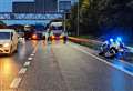 Police officer knocked off bike by lorries during Just Stop Oil protest