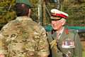 King returns to Royal Marines training base to meet recruits