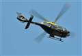 Police helicopter searches for driver 'with weapon'