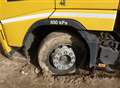 Wrong turn lorry stuck in mud 