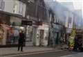 High street cordoned off as fire breaks out above shops