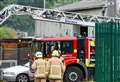 30 firefighters tackle garage blaze