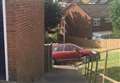 Child injured after car ploughs into house