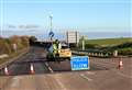 Road remains closed after bike crash with lorry