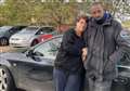 Couple living in car and washing at service station