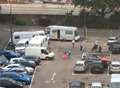 Travellers set up camp in car park