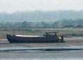  Beached boat towed free 