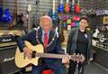 Mayor plays guitar at launch of music hub