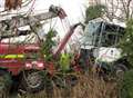 Dustcart overturns in ditch