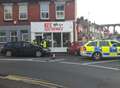 Pensioner ploughs car into shop