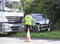 Woman taken to hospital after her car collides with lamppost