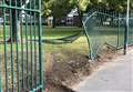 Van crashes into school railings