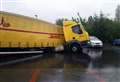 Lorry falls into sinkhole