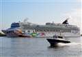 Huge ship sails up Thames