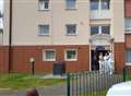 Murder charge over flats death