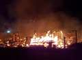 Boats and buildings destroyed in huge blaze