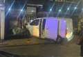 High street shut off after van ploughs into shop