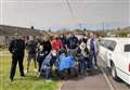 Volunteers help renovate burglary victim's home