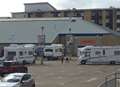 Travellers set up camp in car park