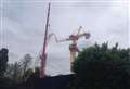 Crane collapses at building site